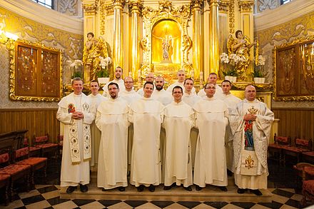 The Pauline novices of the novitiate of 2014–2015, with the Novice Master and his Socius, after being clothed in the habit of the Order.