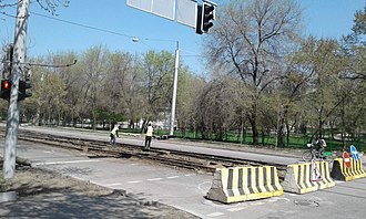 Tram tracks being dismantled in Zharokova Street (2018) AlmaAtaTramwayDismantling.jpg