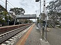 The station's pedestrian footbridge, viewed Westbound from Platform 2, August 2024