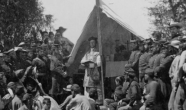A Catholic Union Army chaplain celebrating mass for soldiers and officers during the American Civil War (1861–1865).