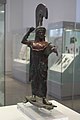 Bronzová socha s nápisem: „Meleso ji věnoval Athéně jako desátek“.
