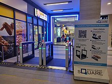 An automatic self-check-in station at Paya Lebar Square mall implemented to facilitate contact tracing. Automate SafeEntry Self Check-in gates at Paya Lebar Square.jpg