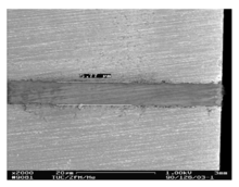 Cross-section SEM photo of SU-8 bonded wafers B-ad-semphotoofsu8.png