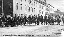 The Massachusetts National Guard mounted on horses during the strike. Battery A starting home, Canal St. March 16, 1912.jpg