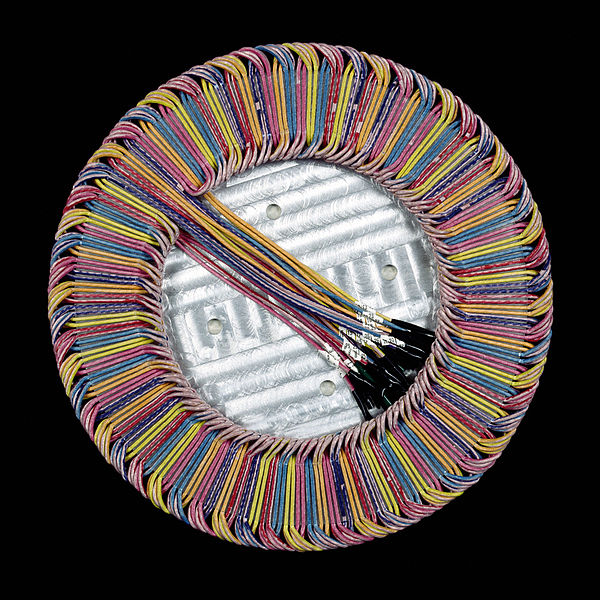 File:CSIRO ScienceImage 11648 Ironless stator for Solar Car Race motor showing the 3phases of the winding in separate colours.jpg