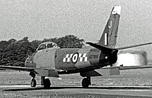 No. 92 (F) Squadron Canadair Sabre F.4 XD769 in 1955 wearing the squadron's red and yellow check markings on its fuselage Canadair Sabre F.4 XD769 J.92 Hooton Park 24.07.55 edited-2.jpg