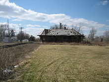 A crumbling rail station in Chenoa. The depot has since been torn down, apparently during fall 2009. Chenoa Il Rail Sta1.JPG