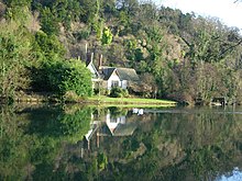 Spring Cottage, Stephen Ward's rented riverside cottage on the Cliveden estate, one of the key locations in the Profumo affair Cliveden Estate from the River Thames - geograph.org.uk - 94809.jpg