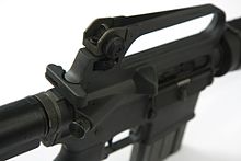 The AR-15A2's most distinctive ergonomic feature is the carrying handle and rear sight assembly on top of the receiver. Colt AR-15 Sporter Lightweight rifle - upper handle (8378298701).jpg