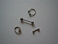Circular barbell, barbell, ball closure ring and curved barbell