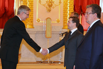 Hauge presented his credentials to Dmitry Medvedev in February 2009. Dmitry Medvedev with Knut Hauge.jpg