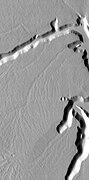 Dendritic channels on mesa of Echus Chasma. Image is 20 miles wide. Image taken with THEMIS.
