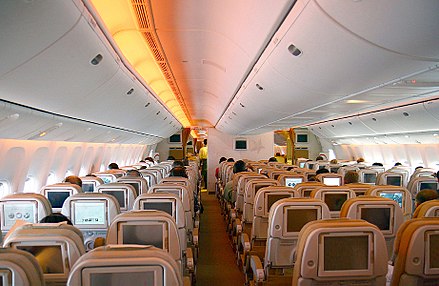 The Economy cabin of an Etihad Airways Boeing 777-300ER in a 3–3–3 layout