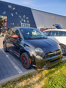 Fiat 500 C is convertible version of the Fiat 500 city car with a a  full-length sunroof. Fiat 500 C interior close up on driver's seat,  steering wheel and gauges. foto de