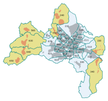 La division administrative de Fribourg. Les villages sont en vert et les quartiers urbains en bleu.