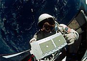 Gemini 12 - Edwin Aldrin in open hatch of spacecraft during EVA