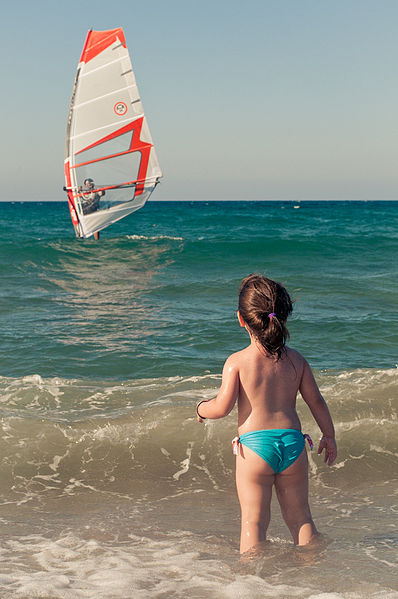 File:Girl and a windsurfer.jpg