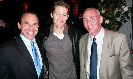 Morrison (center) with LGBT activist couple Kevin and Don Norte at a PFLAG fundraiser in 2010