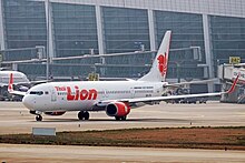 A Thai Lion Air Boeing 737-900 at the airport