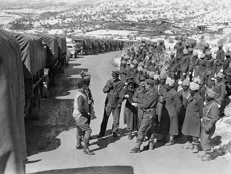 File:Indian soldiers stand next to a supply convoy en route to the Soviet Union.jpg