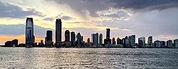 View of the waterfront of Downtown Jersey City, dubbed Wall Street West, at sunset Jersey City Skyline sunset (cropped).jpg