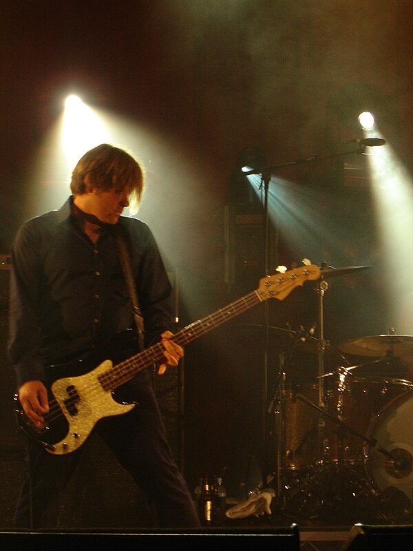 Bass guitarist John Collins, one of the founders of Powderfinger, is shown at the Rock and Soul Revue, Brisbane, in January 2005.