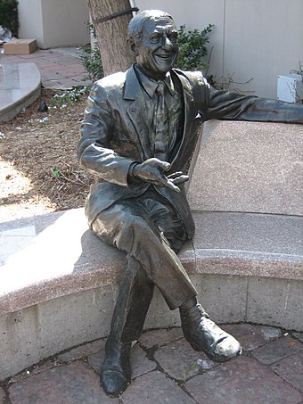 A statue of Johnny Lombardi, who launched Canada's first multicultural radio station in 1966 from Little Italy.