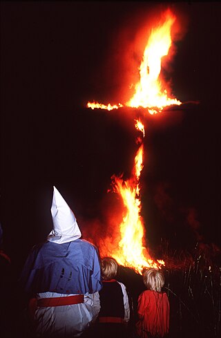 <span class="mw-page-title-main">Cross burning</span> Antiquated practice now associated with the Ku Klux Klan