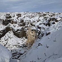 Kinder Downfall frozen in winter