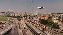 Kowloon City, 1998. Prince Edward Road is the flyover in the photo. A China Airlines Boeing 747 is seen in the photo.