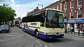 English: Levers Coaches 6010 (SIB 5373), a DAF MB230/Van Hool Alizee, in Blue Boar Row, Salisbury, Wiltshire. Levers Coaches is part of Tourist Group, itself the coaching division of bus company Wilts & Dorset. The coach's fleet number fits into the group numbering system. This coach wears the previous livery. All Tourist Group fleets now have a new livery, with the same base livery scheme and differing fleet names.