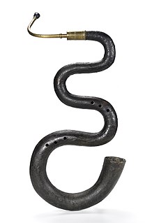 <span class="mw-page-title-main">Serpent (instrument)</span> Wooden S-shaped early brass instrument