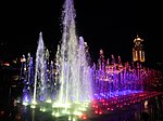 Fountain in front of the shrine with Philippine flag-inspired lighting