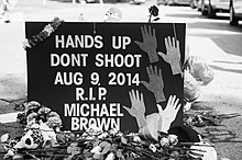 A makeshift memorial placed during protests Memorial to Michael Brown.jpg