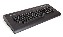 The Memotech MTX500 model with a black case. The keyboard is shown without a monitor or other peripherals attached. The keyboard enclosure houses the computer.