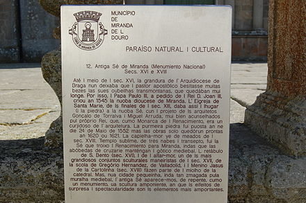 Public sign with the history of the Cathedral of Miranda do Douro, written in Mirandese.