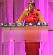 Mo'Nique giving a speech in 2010