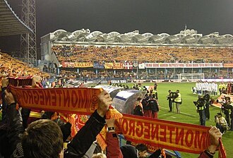 Podgorica City Stadium, Montenegro fans with national features MontenegrinFans2.jpg