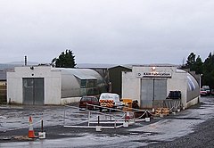Nissen huts in use as workshops in Borve, Skye