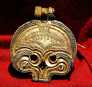 Pelta-shaped brooch from Finnestorp, Trävattna parish, West Geatland. 475–525.