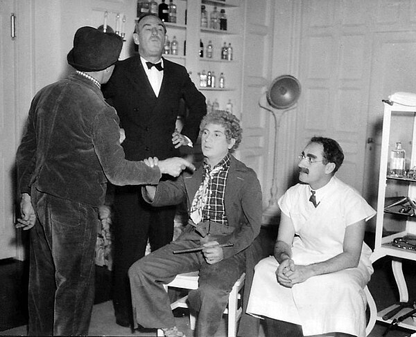 The Marx Brothers on the A Day at the Races set with Wood