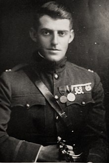 Half-length portrait of man in military attaché dress