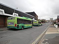 The rears of Southern Vectis 2632 Rocken End and 2644 Newtown River (T644 AJT), both Optare Solos, in Carter Avenue, Shanklin, Isle of Wight. Bus 2632 was laying over, whilst bus 2644 had just arrived on route 24.