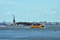 Staten Island Ferry and Liberty Island seen from Brooklyn Heights 02 (9423264394).jpg