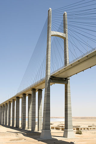 The 154 meter-high main pylons are shaped to resemble Egyptian obelisks as they taper to the top.