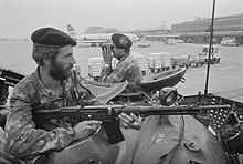 Swiss tank crewmen with the Stgw 57 in 1983. Swiss Tank Crew Provide Airport Security During Palestine Conference 1983.jpg