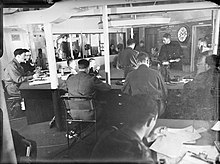 Hilary's operations room at dawn on 10 July, the first day of Operation Husky The Royal Navy during the Second World War A17944.jpg