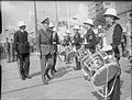 Prince Bernhard of the Netherlands inspecting the Royal Marine Band (Portsmouth Division) during the opening of an Allied Naval Exhibition in Rotterdam. 1945.