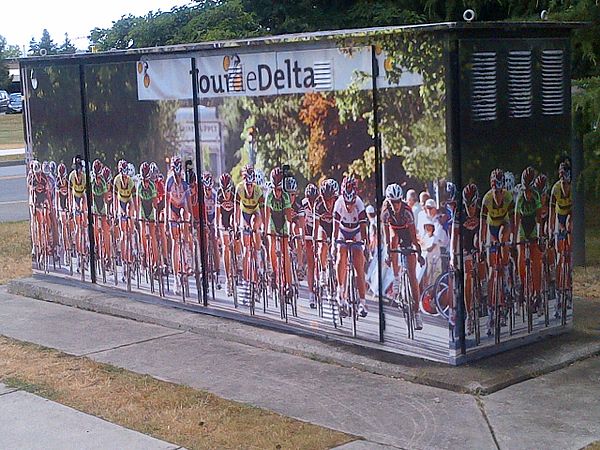 Tour de Delta wall cover on electrical box outside of Delta, British Columbia municipal hall