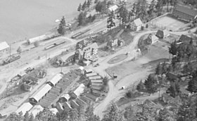 Bridge River townsite at South Shalalth – closeup of hotel and residential area, 1940s